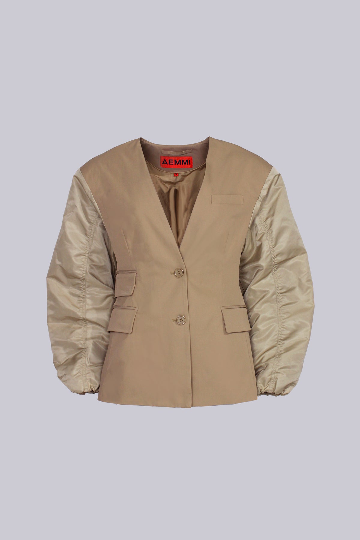 Beige oversized blazer with bomber-style sleeves by AEMMI