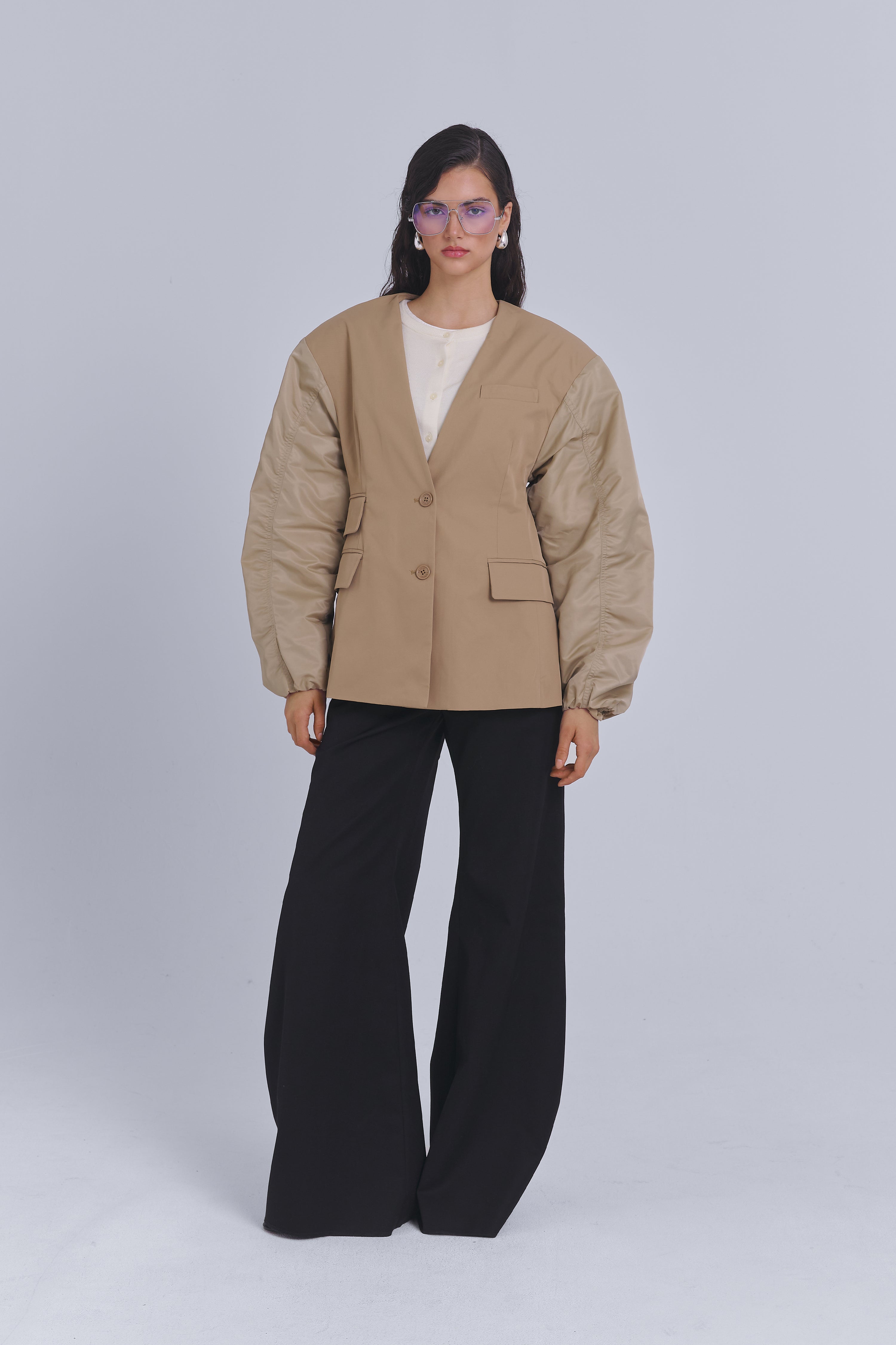 Beige oversized blazer with bomber-style sleeves by AEMMI